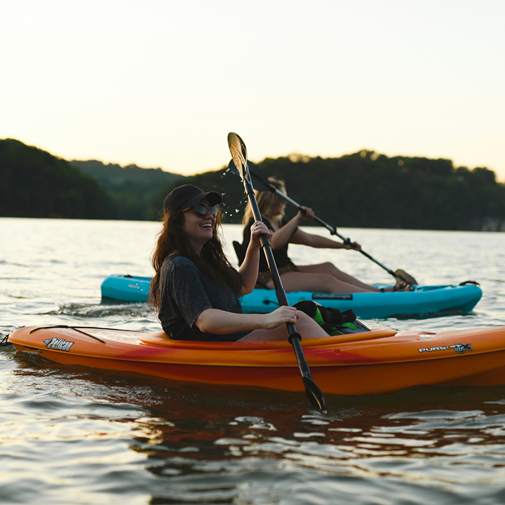 women kayaking on the water, where to go for watersports in hong kong